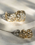Morel Hoops, Brass